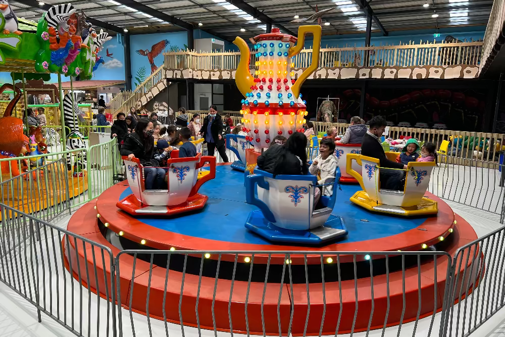 Children's amusement park with colorful rides and attractions.